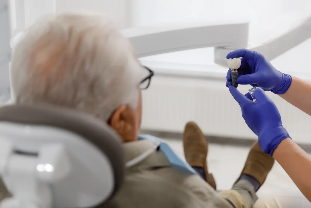 who does dental implants